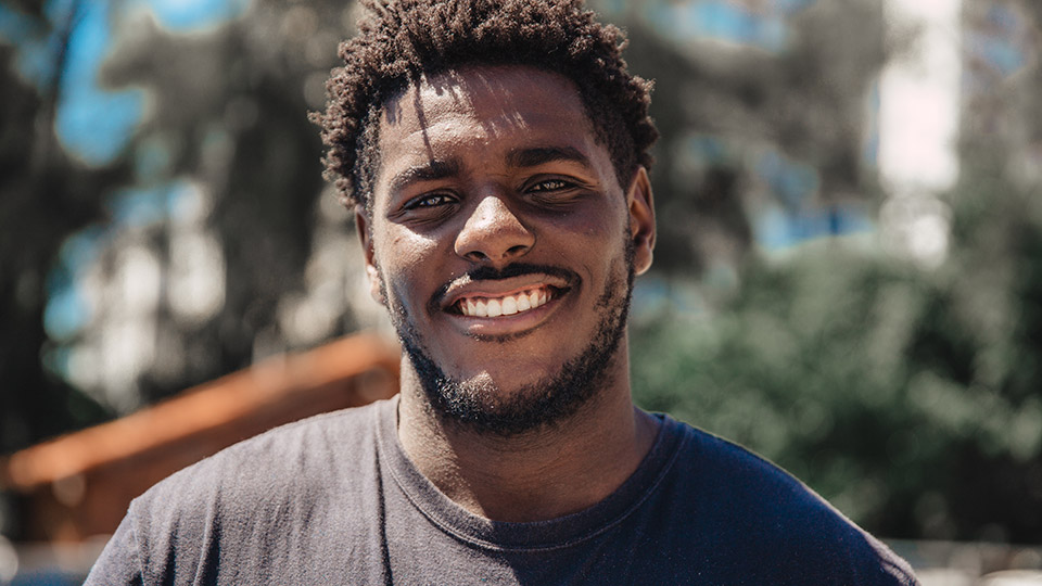 Photo of young man smiling