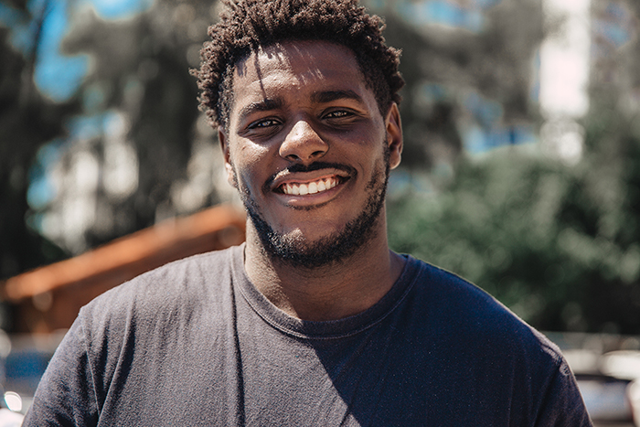 Photo of young man smiling