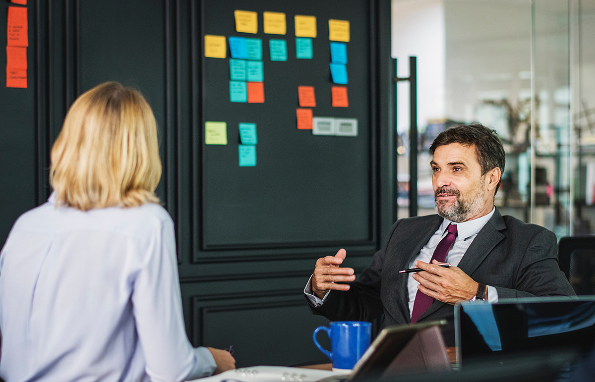 Image of two people planning