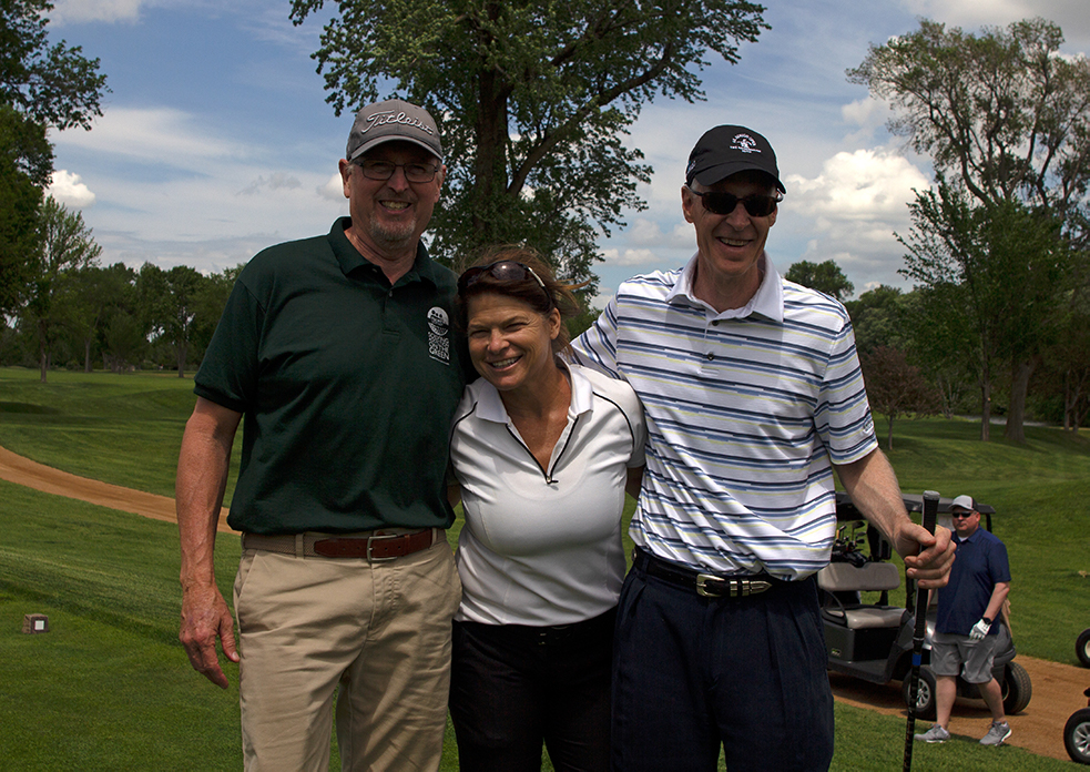 Photo of supporters at golf tournament