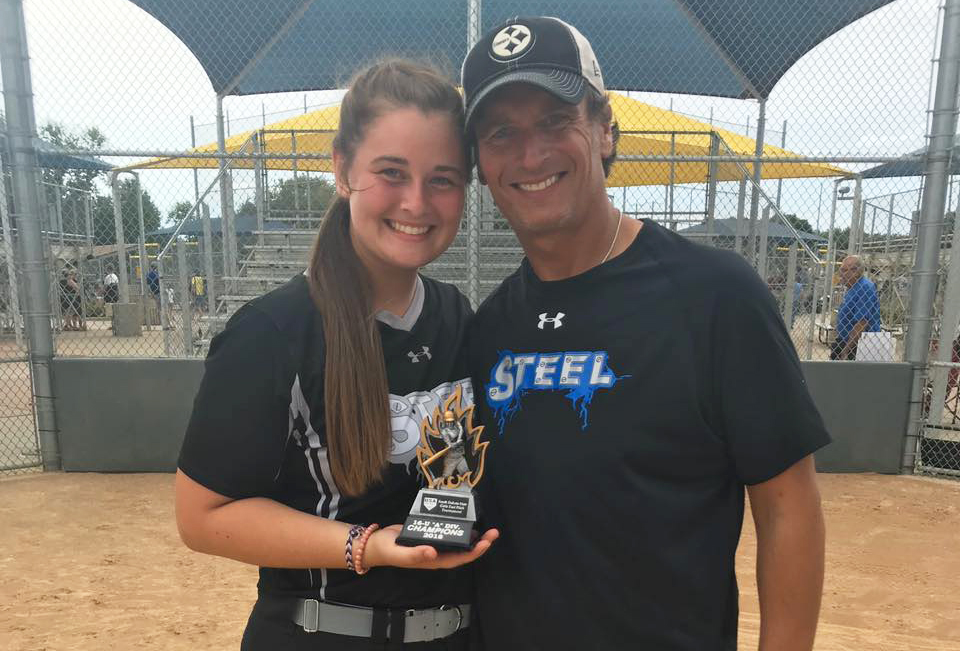 Photo of father and daughter at softball championship in Sioux Falls, SD