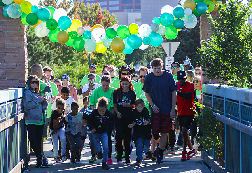 Photo of runners taking off at addiction wellness 5K in Colorado Springs, CO