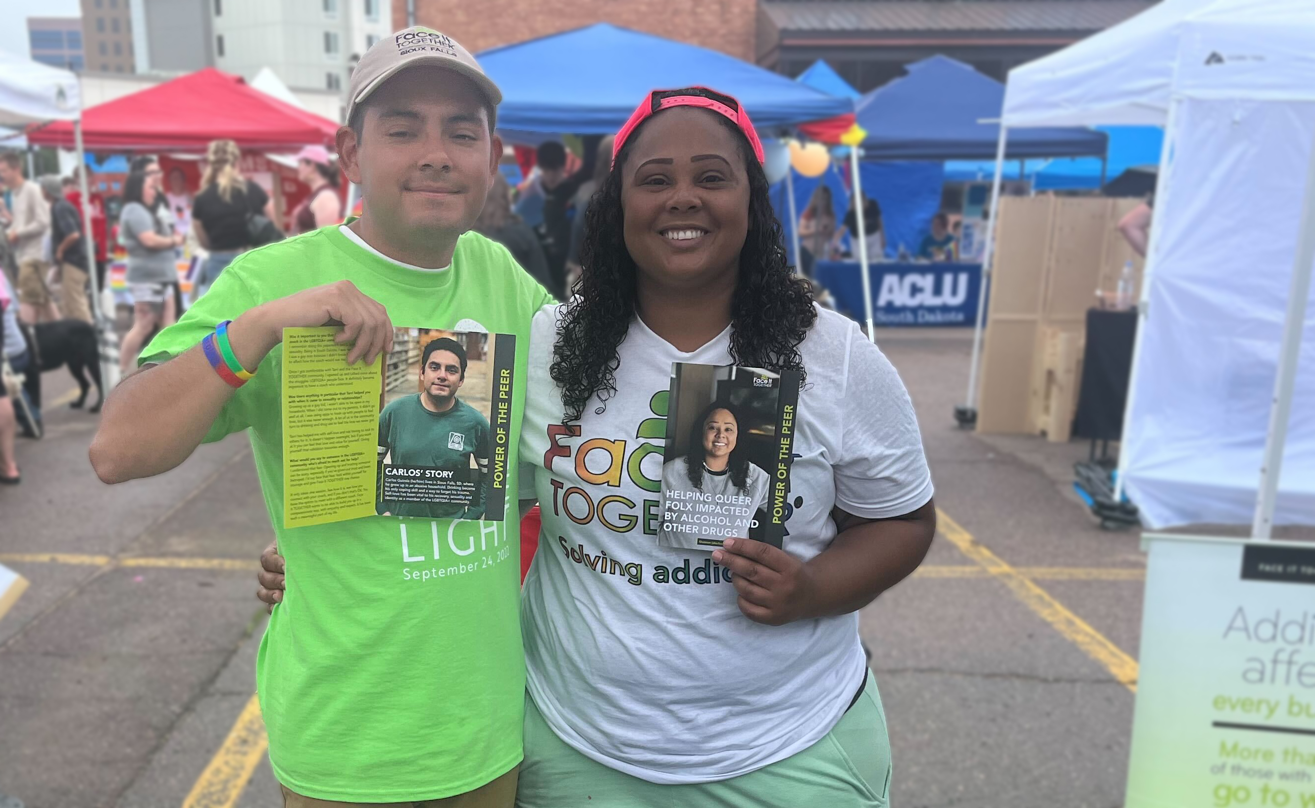 Photo of peer coaches Carlos and Shannon at the 2023 Sioux Falls pride event