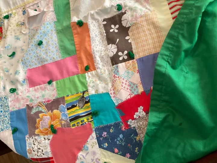 Photo of quilt made of many fabrics