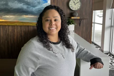 Photo of Shannon, woman in office