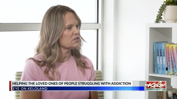 Photo of woman being interviewed 